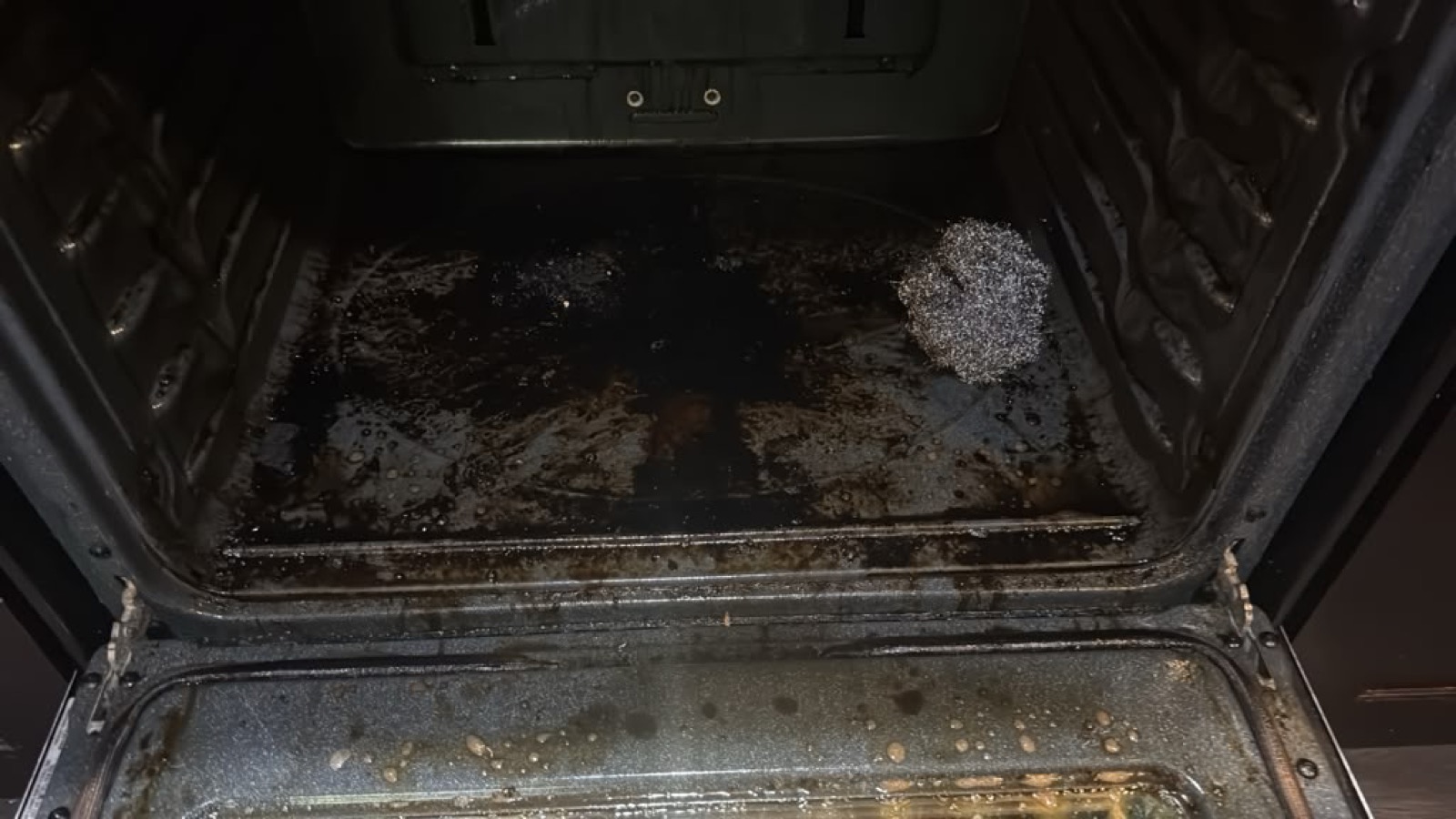 Oven before cleaning by Barboza House Cleaning